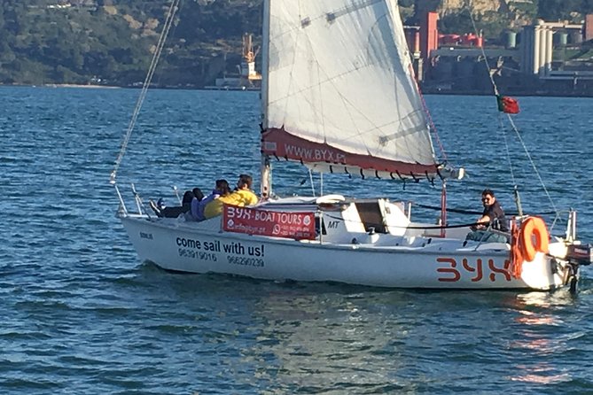 Lisbon Sunset Sailing Tour with White or Rosé Wine and Snacks - Wine, cheese, and the sunset hour