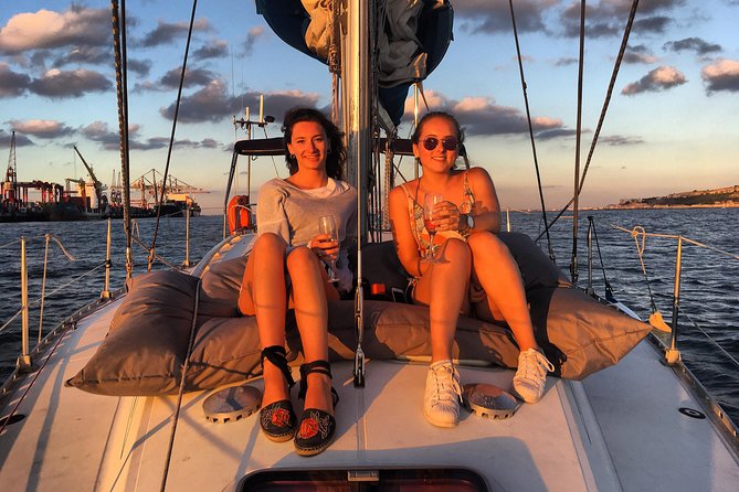Lisbon Sunset Sailing Tour with White or Rosé Wine and Snacks - What the boat ride feels like