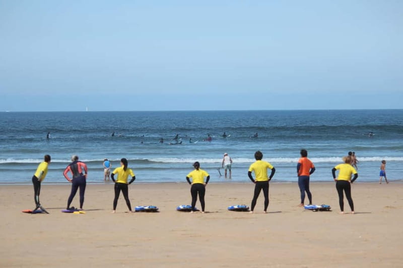 Lisbon: Surfing Lesson on Costa de Caparica Beach - Stretching, treats, and the end of the session