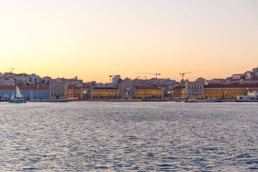 Lisbon: Tagus River Sunset Tour with Snacks and Drink - Commerce Square and Lisbon’s lower waterfront