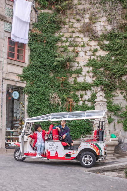Oporto Tuk-Tuk Tour: Fast, Fun & Flexible – 1H to Full Day! - Clérigos Tower and Praça da Batalha