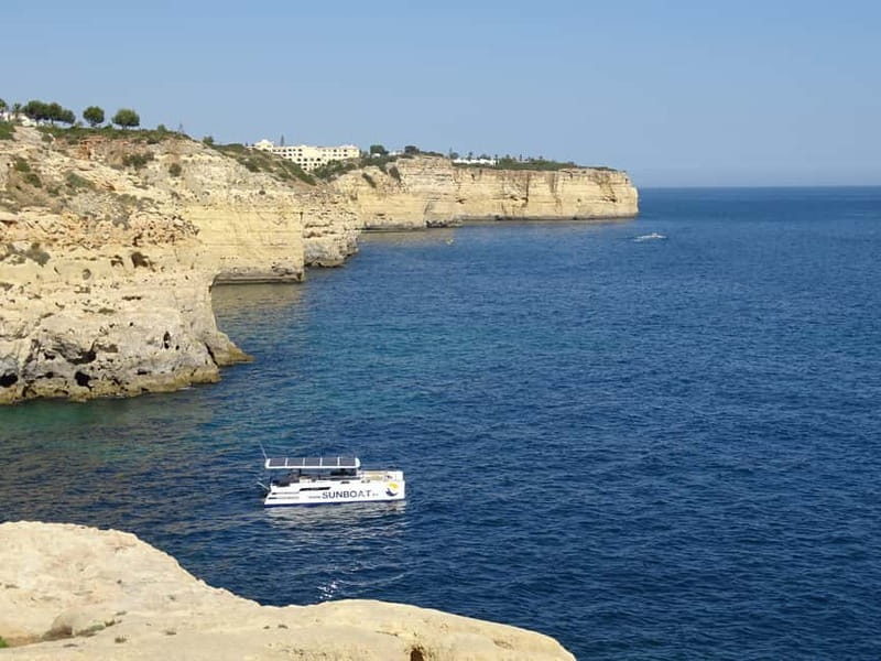 Portimão: Benagil Caves & Golden Coast Eco Catamaran Tour - The summer swim stop and sunset difference