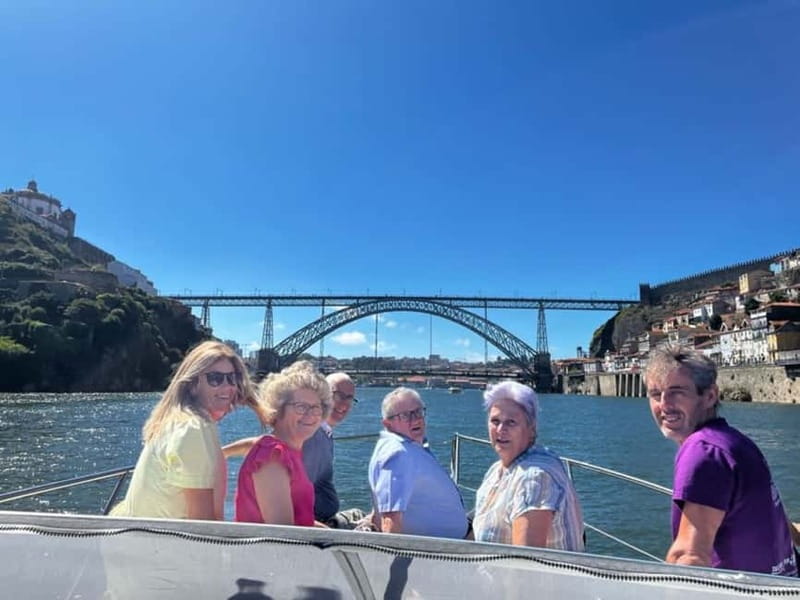 Porto: 6 Bridges Yacht Cruise with Local Wine & Snacks - Wine, Porto tasting, and a regional board