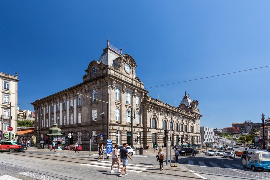 Porto: City Train Tour, River Cruise & Wine Cellar - Inside Real Companhia Velha’s historic cellar
