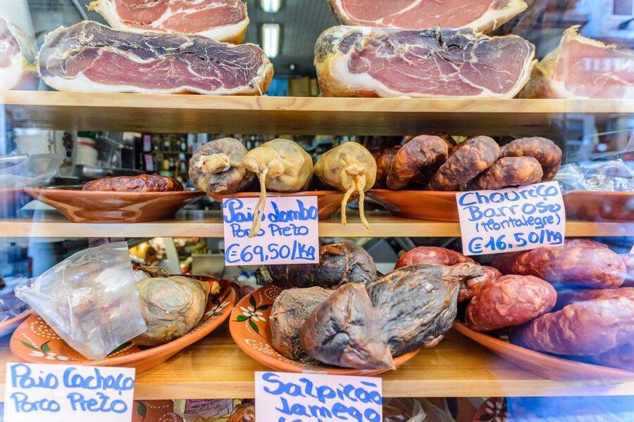Porto: Delicious Food and Wine Walking Tour - Cheese boards, cured meats, olives, and sardines