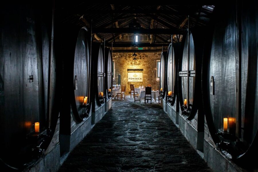 Porto: Fonseca Cellar Tour & Fado Show with Optional Dinner - Starting at Fonseca, with Port on the walls