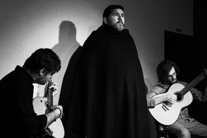 Porto: Live Portuguese Fado Experience with Port Wine - Portuguese guitar and a glass of Tawny Port