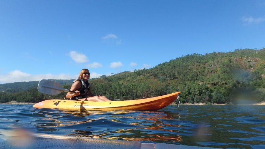 Porto: Peneda-Gerês National Park Tour with Kayaking & Lunch - Kayaking across Caniçada reservoir