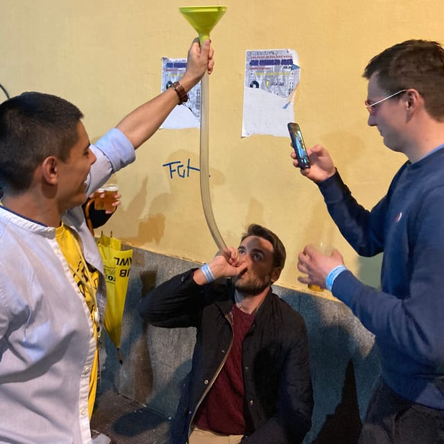 Porto: Pub Crawl with 7 Drinks, Games, and VIP Club Entry - Rua de Cândido dos Reis and the late-night finish