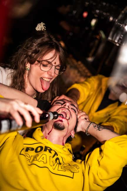 Porto: Pub Crawl with 7 Drinks, Games, and VIP Club Entry - Starting at Fonte dos Leões near the university