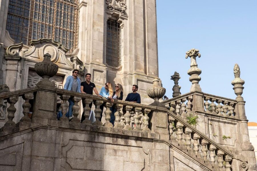 Porto: Walking Tour, Lello Bookshop, Boat and Cable Car - Walking toward the Dom Luís I Bridge