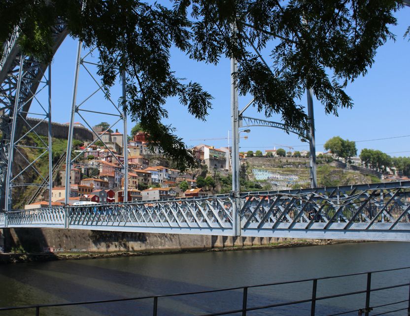 Porto: Wine Tasting with Tapas Walking Tour - Walking through Porto’s old streets and Ribeira