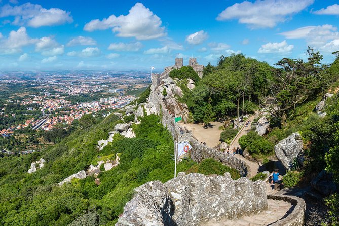 Private Half Day Tour to Sintra and Pena Palace from Lisbon - Moorish Castle: stone walls above Sintra