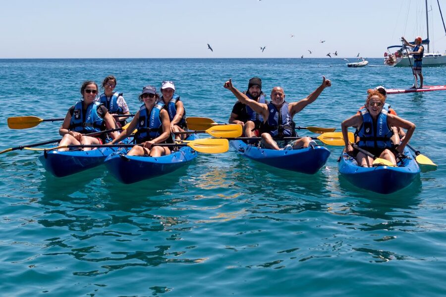 Sesimbra: Arrabida Natural Park & Caves Guided Kayaking Tour - Caves, tunnels, and cliffside views