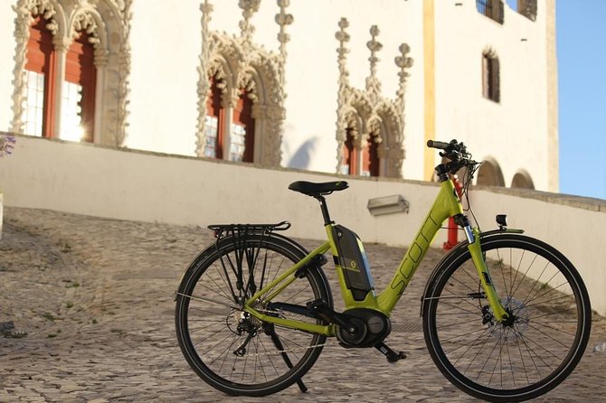Sintra-Cascais Natural Park by E-Bike: 8- hour Tour from Lisbon - Sintra town, palace views, and a traditional pastry