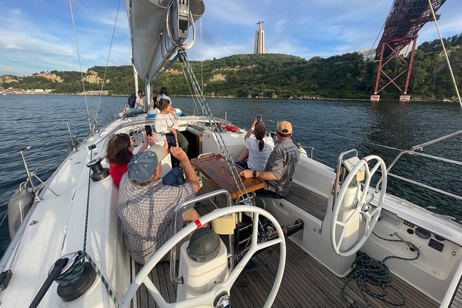 Sunset Boat Tour in Lisbon with Wine - Sailing under the 25 de Abril Bridge