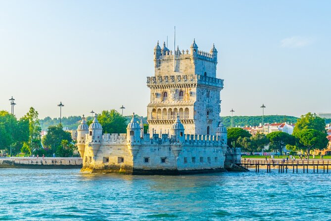 Sunset Boat Tour in Lisbon with Wine - Wine, music, and the sunset question