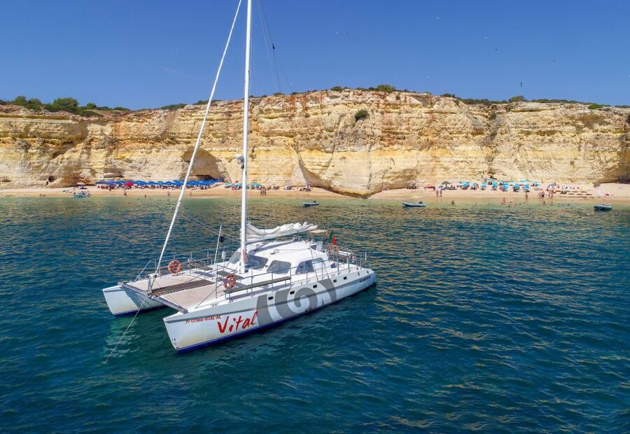 Vilamoura: Guided Sightseeing Cruise with Beach BBQ & Drinks - Reaching the beach by tender boat