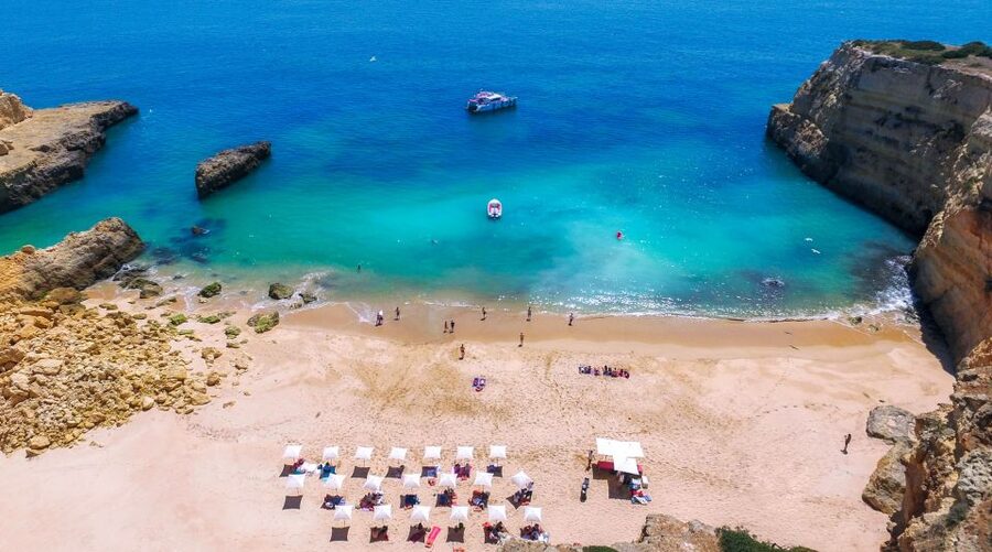 Vilamoura: Guided Sightseeing Cruise with Beach BBQ & Drinks - Following the Algarve coast toward Benagil